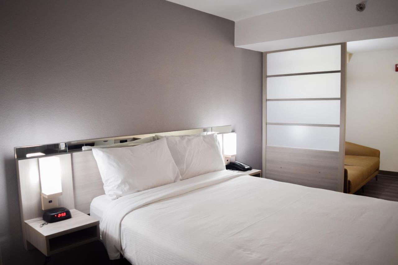 Travelers Inn And Suites Raleigh Buitenkant foto